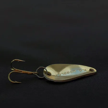 Acme K.O. Wobbler, 3,5g Negro/Blanco/Oro, Cucharilla #22047