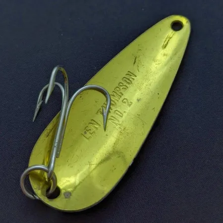 Len Thompson #2, 28g, rojo/dorado, cucharilla #24013