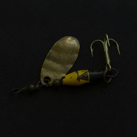 Cucharilla Glen Evans Shyster, latón, 4 g, eje desalineado, #24738