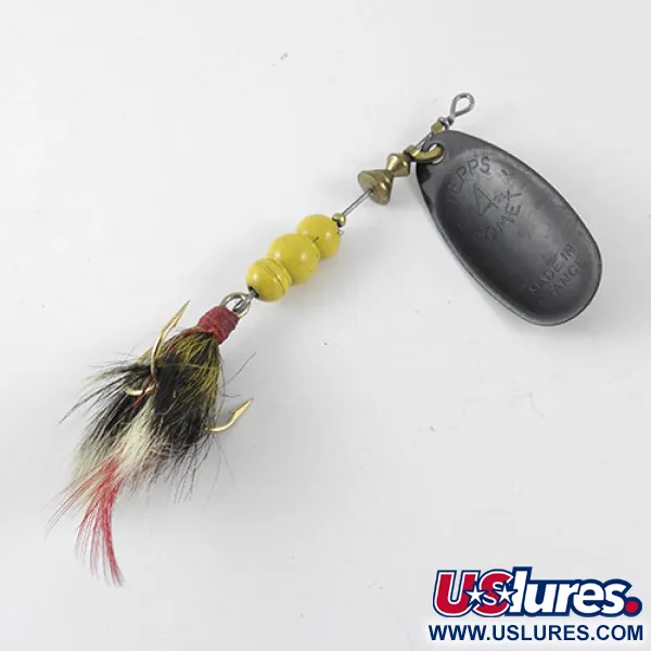 Mepps Black Fury 4 Dressed Cucharilla, Amarillo / Negro, 9g, Triple pluma, #1089