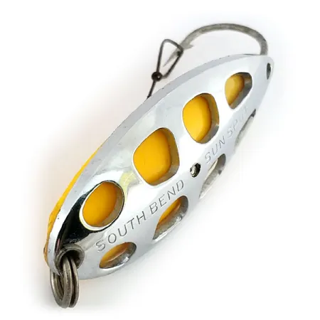 South Bend Sun Spot Cucharilla, Níquel / Amarillo, 14g, perforada, #9652