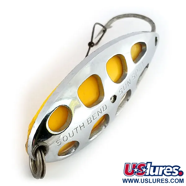 South Bend Sun Spot Cucharilla, Níquel / Amarillo, 14g, perforada, #9652
